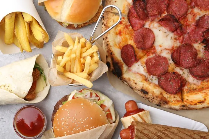 Processed and fast foods — common dietary triggers for IBS symptoms